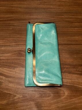 HOBO Teal Frame Clutch Wallet with Gold Accents